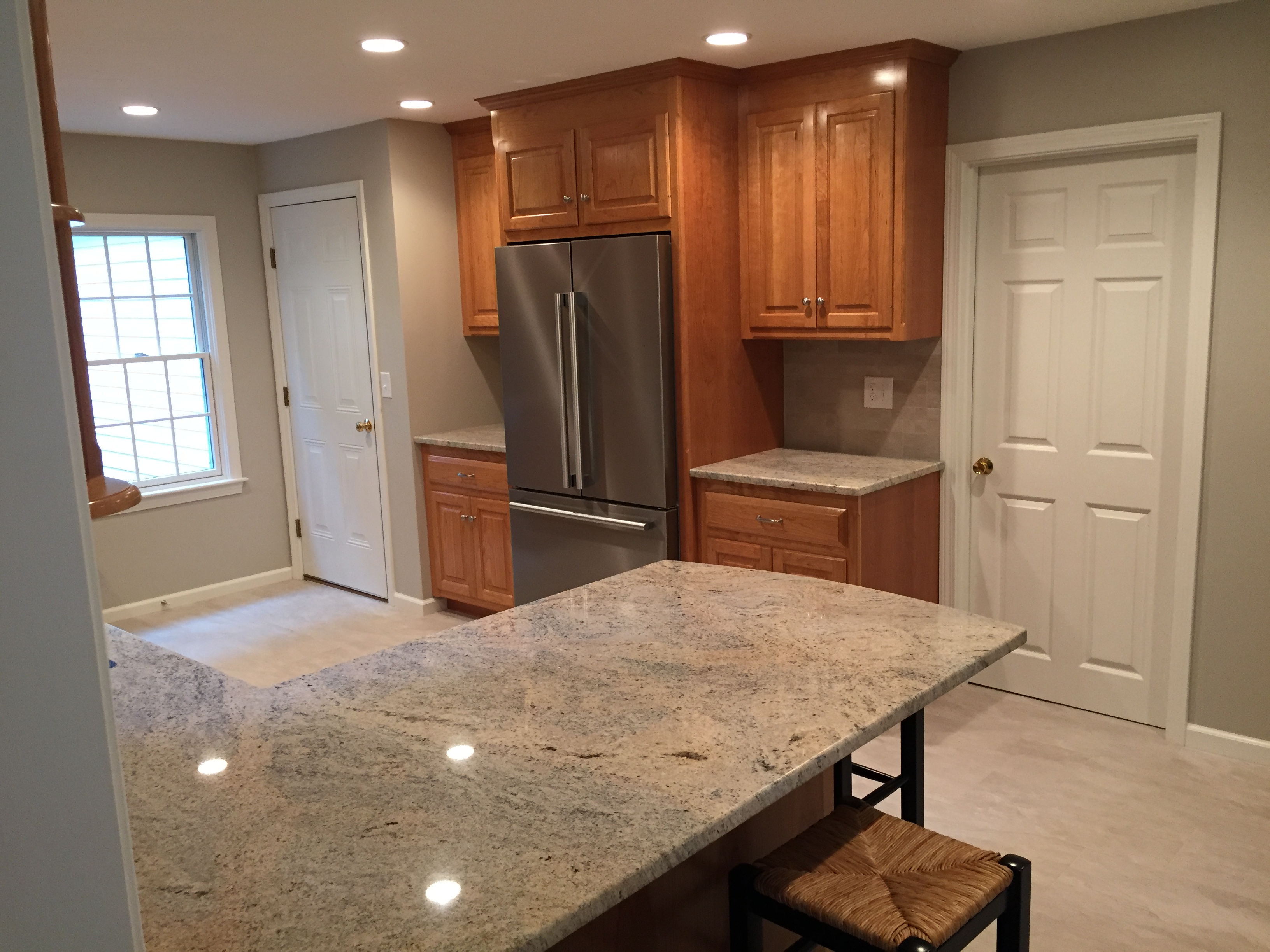 Kitchen w/ Wood Cabinets, Stainless Appliances and Granite Countertops